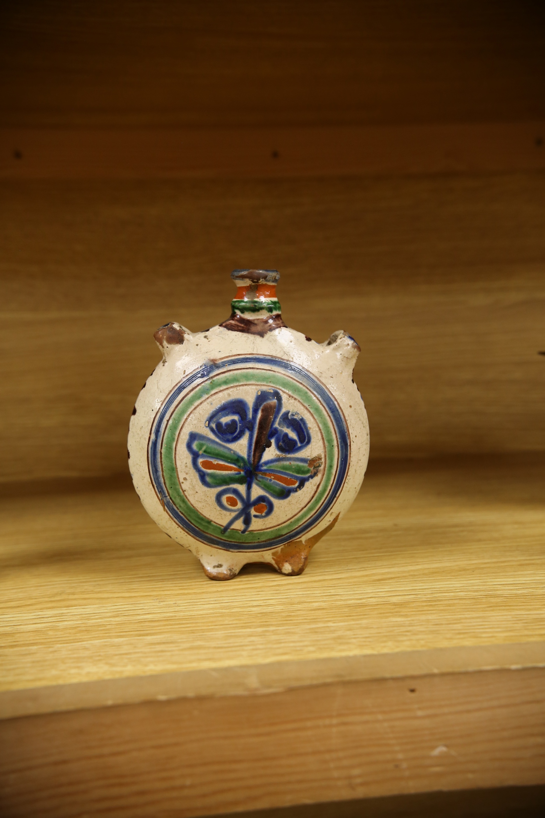 An 18th century? Spanish maiolica pilgrim flask, 17cm. Condition - poor to fair